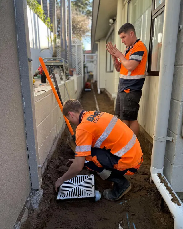 Blake Civil Construction crew installing drainage on a residential Auckland property